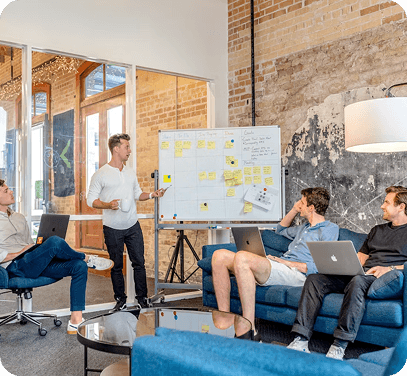People discussing a product roadmap in a meeting room